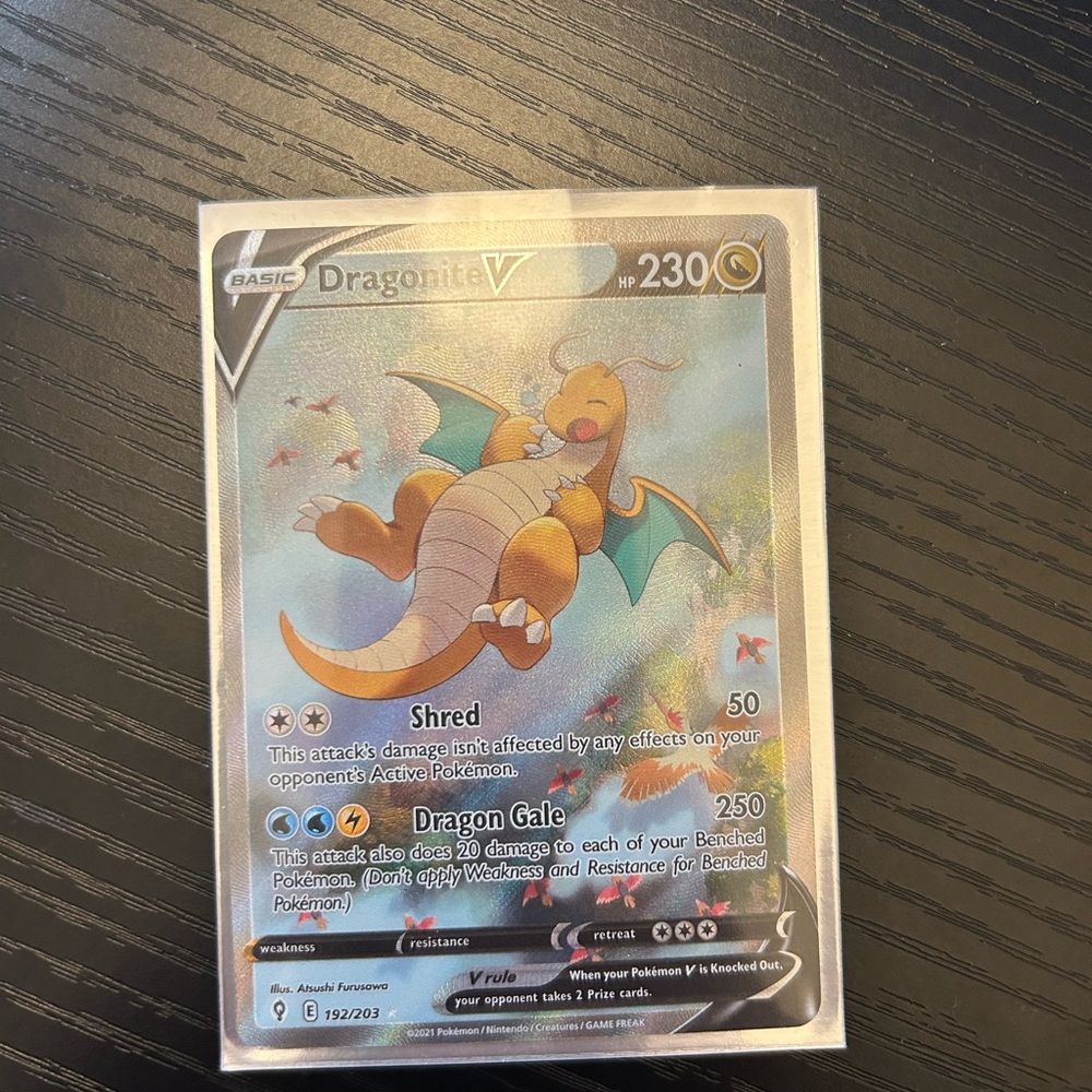 Pokemon Dragonite V Trading Card - Gold and Blue